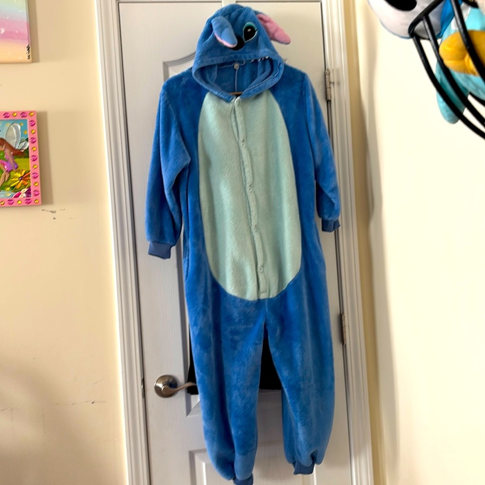 Stitch onesie with zipper at backside. Used but still has a lot of life left